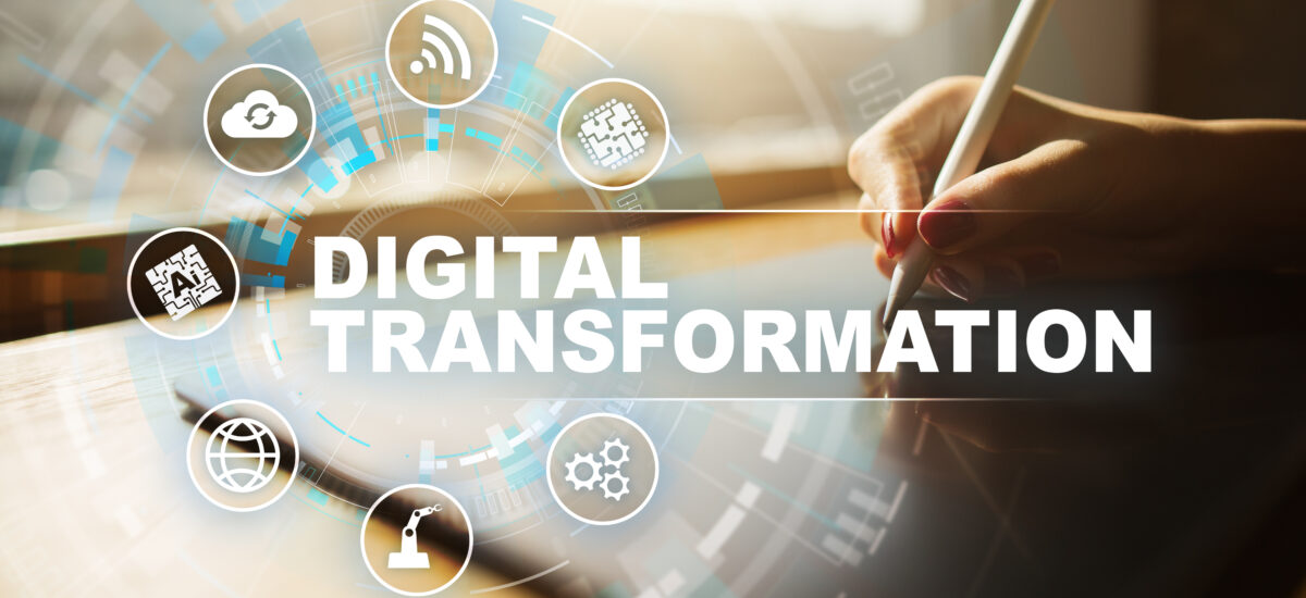 Hand using tablet with digital transformation icons overlay