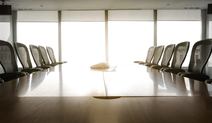 Bright conference room with table and chairs