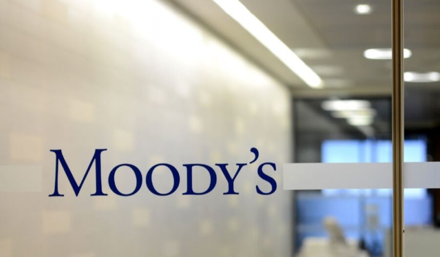 Moody’s logo on office glass wall