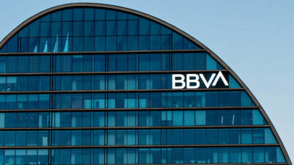BBVA logo on glass facade of Madrid HQ.